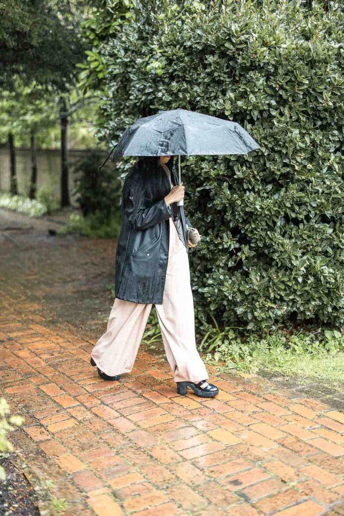 Wedding guest in the rain