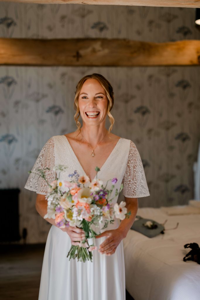 Relaxed wedding photography at Folly Farm Centre in Somerset with beautiful golden light and countryside views.