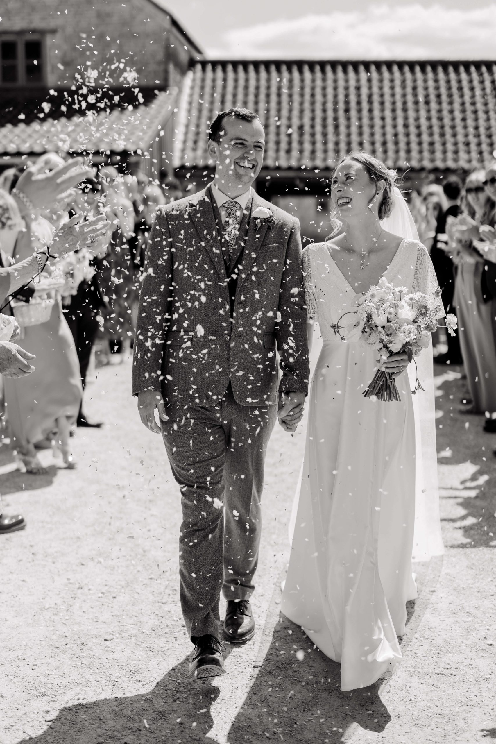 Relaxed wedding photography at Folly Farm Centre in Somerset with beautiful golden light and countryside views.
