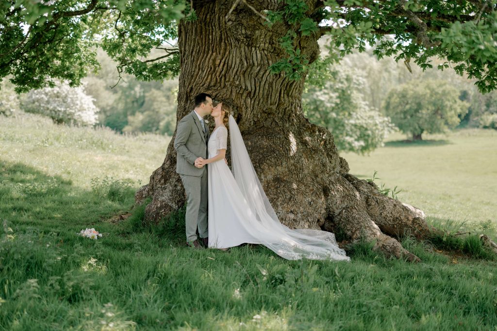 Relaxed wedding photography at Folly Farm Centre in Somerset with beautiful golden light and countryside views.