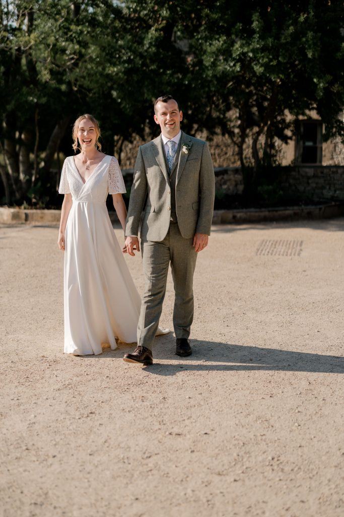 Relaxed wedding photography at Folly Farm Centre in Somerset with beautiful golden light and countryside views.