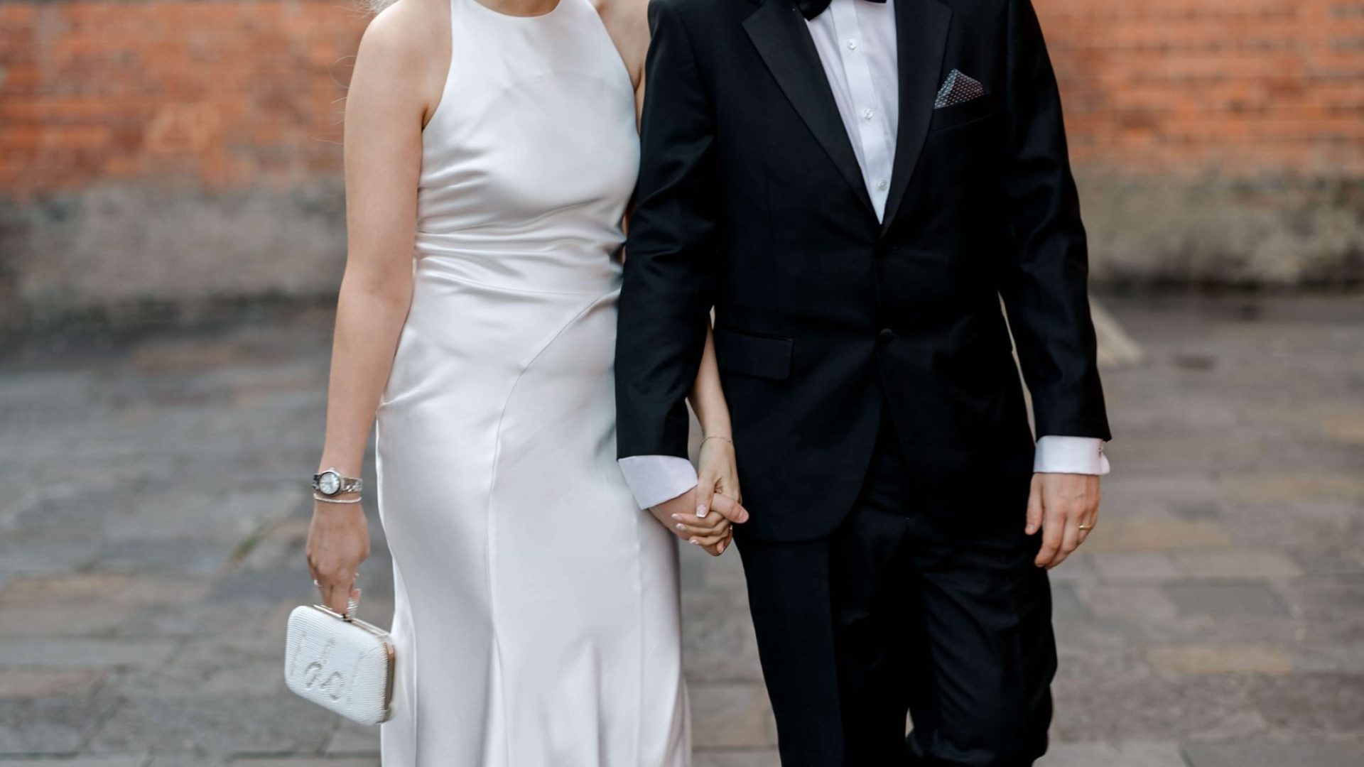 Elegant wedding at the Bombay Sapphire Distillery with unique touches like a karaoke room, Krispy Kreme donuts, and Bombay Sapphire gin cocktails.